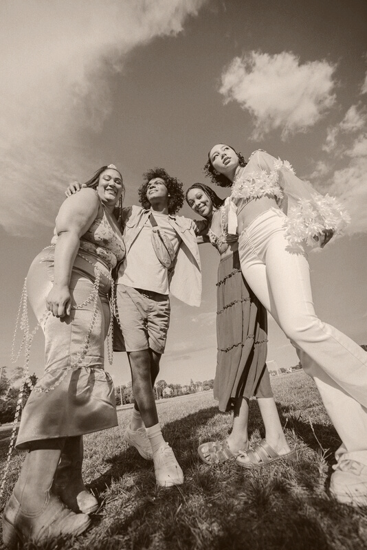 Stylish Friends at an Open Field